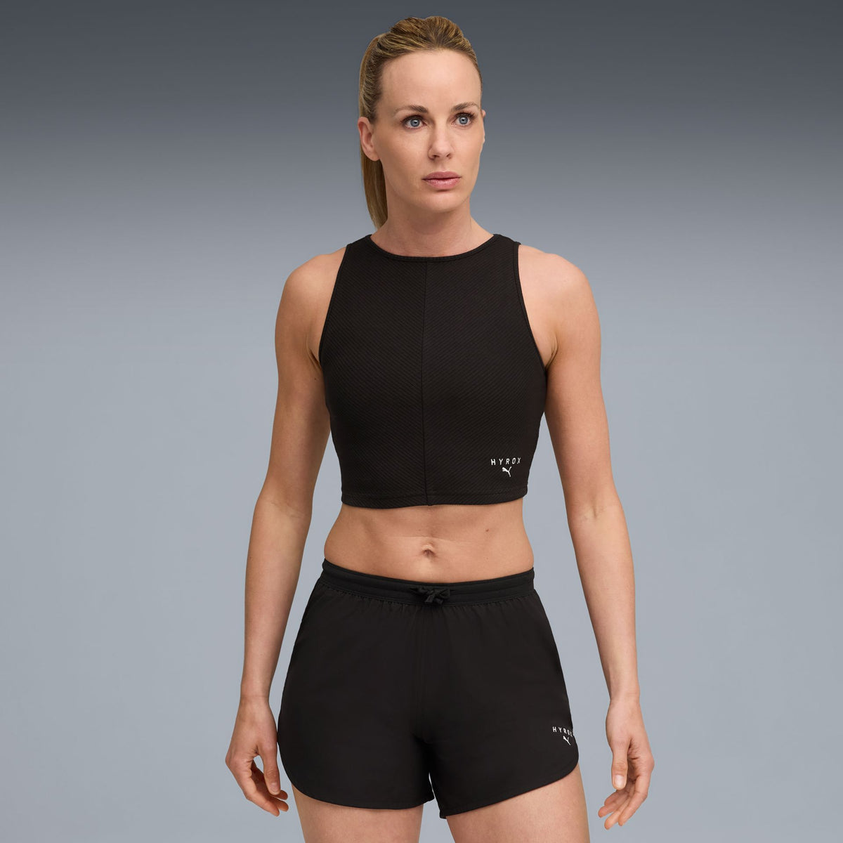 Puma W PUMA x HYROX RIB CROP TANK – schwarz
