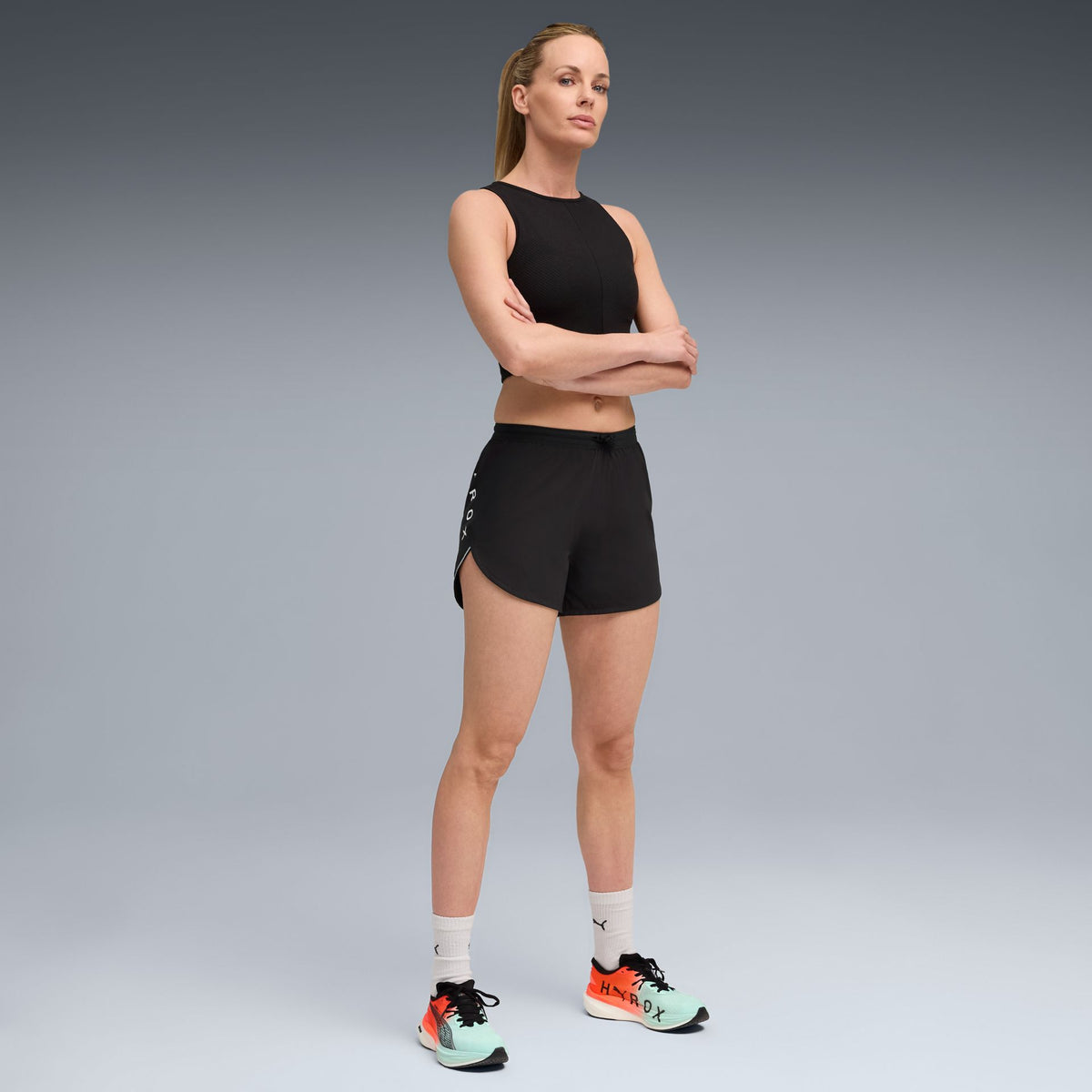 Puma W PUMA x HYROX RIB CROP TANK – schwarz